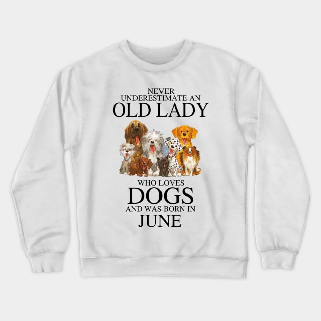 Never Underestimate An Old Lady Who Loves Dogs And Was Born In June Crewneck Sweatshirt by louismcfarland